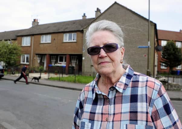 Pensioner Rachel McKinnon and her family are querying the costs of improvement work on her flat building. Picture: Michael Gillen