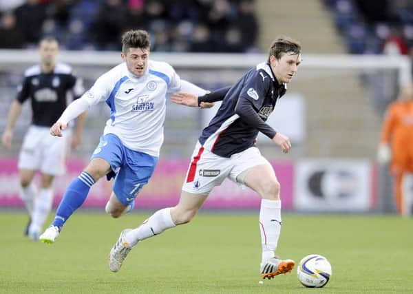17-01-2015. Picture Michael Gillen. FALKIRK. Falkirk Stadium. Falkirk FC v Queen of the South.  SPFL Championship. Lewis Kidd 12 tugs at Blair Alston 8.