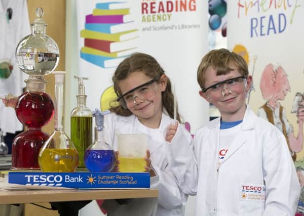 Tesco Bank roll up at Falkirk library where 
Nina McInnes (5) and Ruaridh Burns (5) join in the fun