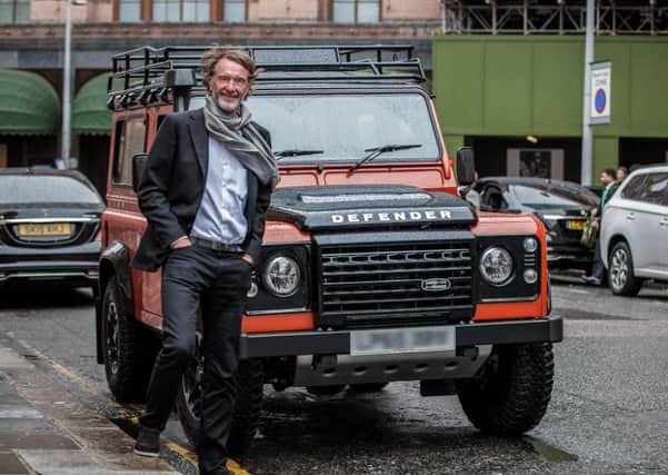 Ineos boss Jim Ratcliffe with a Landrover Defender
