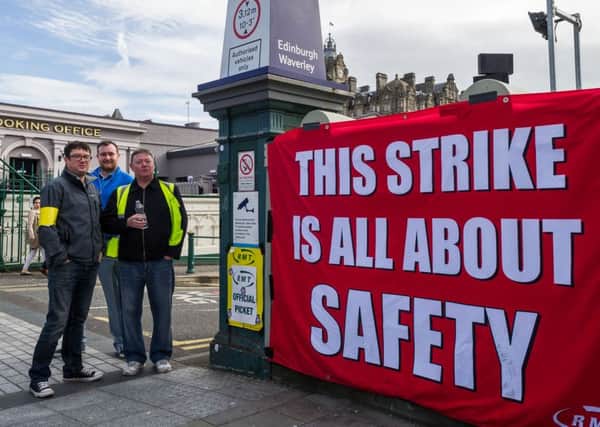 Scotrail strike picket line at Waverley Station in Edinburgh. Credit:  Steven Scott Taylor / J P License