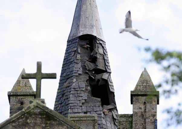 Lightning struck the church tower at 9.52am leaving an 8ft hole in the slate roof section of the tower