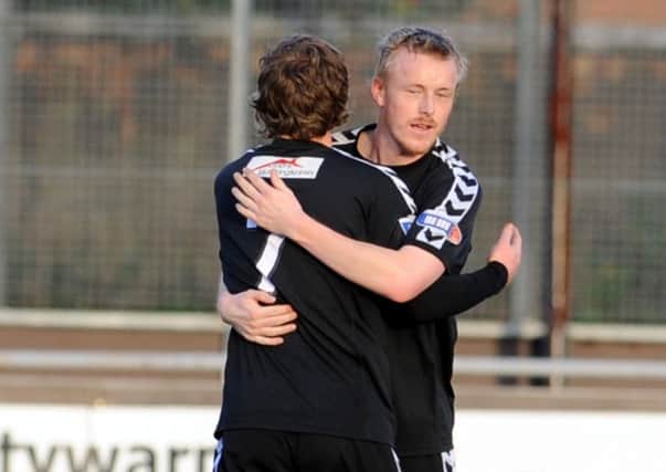 Andy Rodgers celebrates his goal for the Shire against Forfar in November 2009