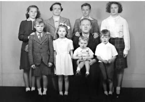 The Clark family from 40 Plantation Cottages - back row left to right,
Mary, Cecilia, George Jnr, Patricia and front row left to right, 
Desmond, Eileen, Brendan and Murray