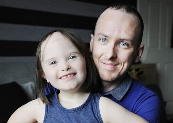 Chris Paterson with daughter Casey. Picture: Alan Murray