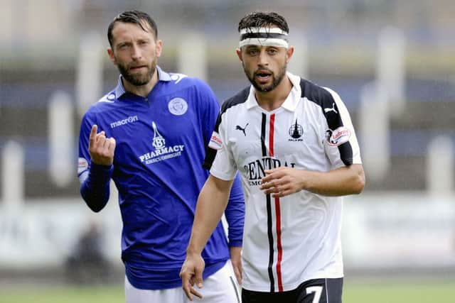 20-08-2016. Picture Michael Gillen. DUMFRIES. Palmerston Park. Queen of the South FC v Falkirk FC. SPFL Ladbrokes Championship. Stephen Dobbie 11 and Tom Taiwo 7.