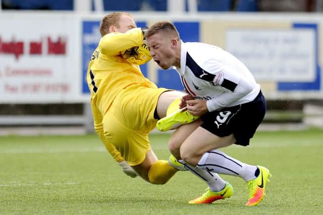 20-08-2016. Picture Michael Gillen. DUMFRIES. Palmerston Park. Queen of the South FC v Falkirk FC. SPFL Ladbrokes Championship. Lee Robinson 1 and John Baird 9.