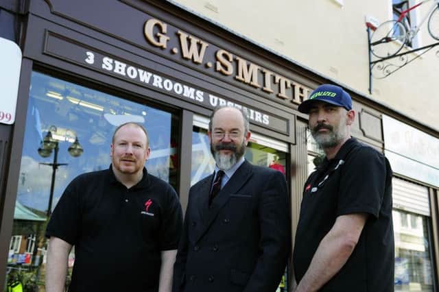 GW Smith Cycles owner Linton Smith, centre, and shop manager Gordon Ferguson, left, and Scott Gilbert, workshop manager
Picture: Michael Gillen