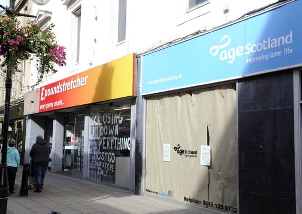 Poundstretchers in Falkirk town centre is closing down, like its neighbour charity Age Scotland. Picture: Michael Gillen