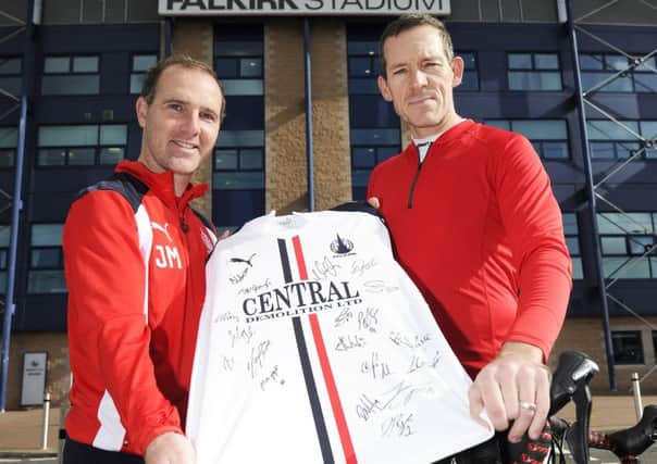 Falkirk assitant manager James McDonaugh, left, with Chris Cadman and the signed Bairns shirt Chris hopes will raise extra money for three childrens charities