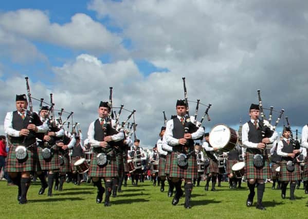 The Buchan Peterson Pipe Band is celebrating promotion to Grade 1 which will see them compete alongside the best bands in the world in 2017.