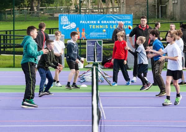 Young players get involved at the opening of the upgraded Dollar Park tennis courts