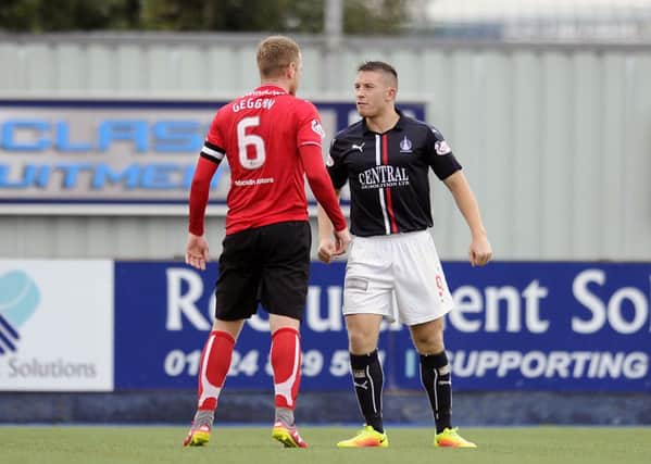 Falkirk's John Baird squares up to Dunfermline skipper Andy Geggan (Pic by Michael Gillen)