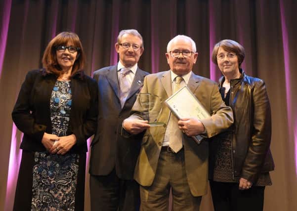 Brian with his wife, Janey, Christine Bell and Ian Howarth of the Communities Along the Carron Association