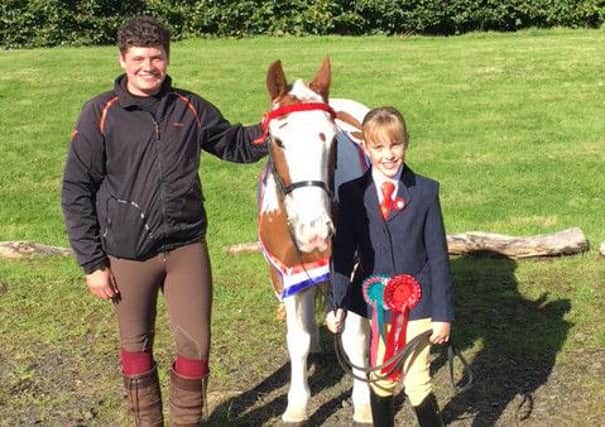 Millie Smith. Has Cerebal Palsy and won British riding for disabled championship. Oct 2016.