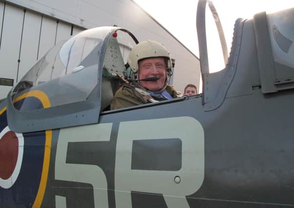 Grangemouth Air Cadets champion Tom McMorrow takes a flight in a real Spitfire