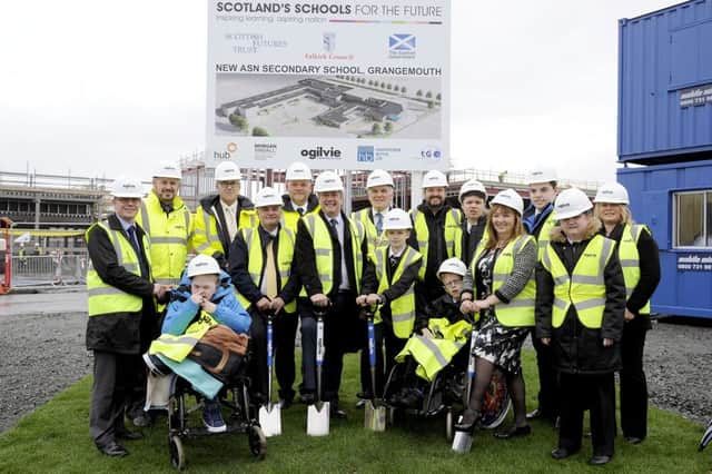 Economy minister Keith Brown joins members of Falkirk Council, Ogilvie Construction and pupils from Carrongrange School on site at the new development