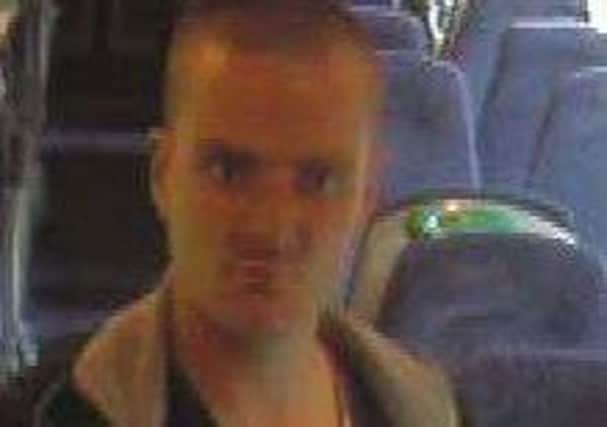 British Transport Police release this image of man they are looking to speak to in connection with train assault