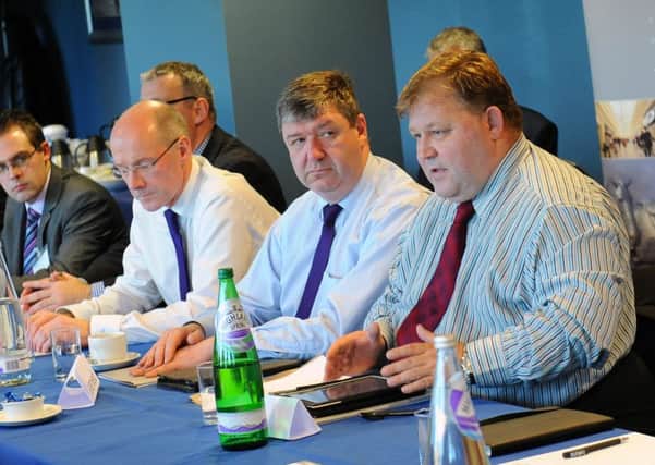 Council leader Craig Martin, right, with Secretary of State Alistair Carmichael and John Swinney MSP discussing future of Ineos