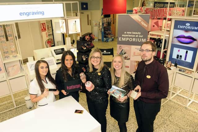 The Emporium is now open in Boots' Falkirk High Street store, left to right,  Rachel Baird, customer assistant; Lorraine Russell, customer assistant; Emma Kean, store manager; Sarah Heron, assistant manager and Ross Gardner, assistant manager
Picture: Michael Gillen