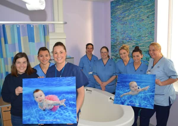 Elaine Jackman donates the Water Baby pictures to the Forth Valley Royal Hospital maternity unit