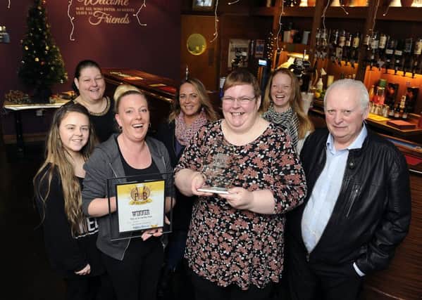 Director Jill Clelland and staff from the Bridge Inn celebrate their success once again in our Pub of the Year competition. Picture: Michael Gillen