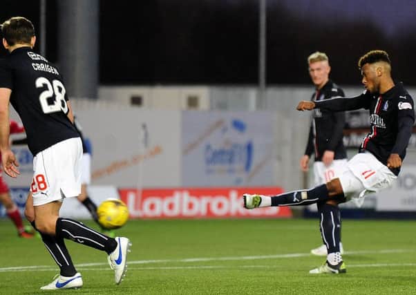 Myles Hippolyte nets Falkirk's first goal against Queen of the South