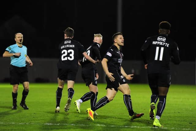 Falkirk players celebrate Craig Sibbald's equaliser. Pic by Michael Gillen.