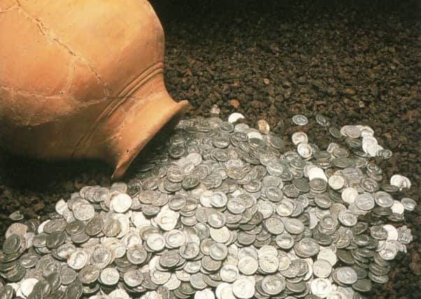 The hoard of Roman coins discovered in August 1933 and (below) Robert Wallace, the workman who unearthed them.