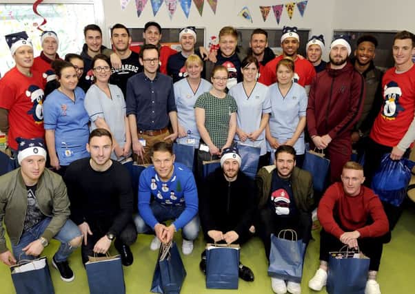 Falkirk players dropped in and met the medical staff on the ward as well as the patients. Picture by Michael Gillen.