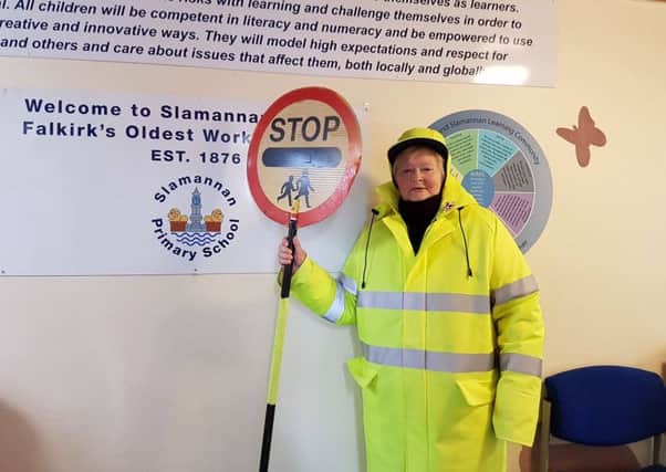 Mary Robertson has retired from her job as Slamannan Primary School's crossing guard - both her mum and her grandfather were crossing guards on the same road before her