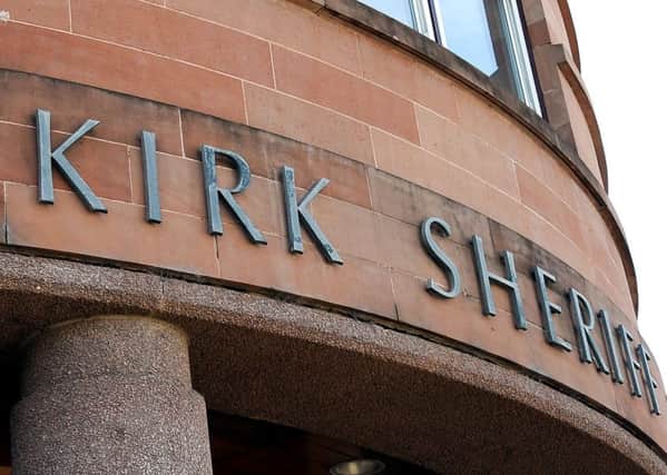 Falkirk Sheriff Court heard John Forsyth admitted spitting on police officers.