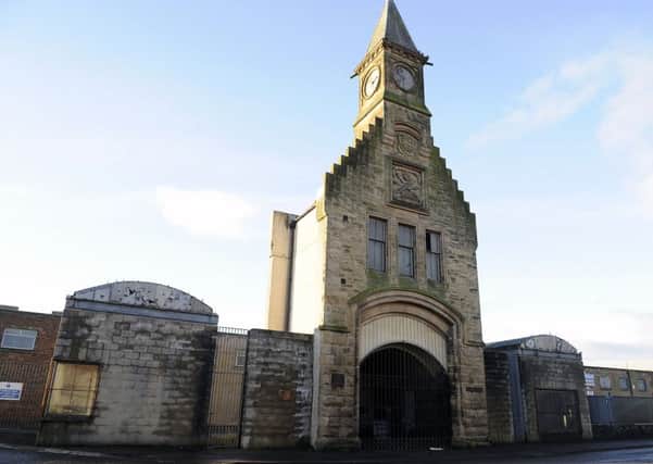 The plaque marking the Burns visit is missing from the left hand side of the clock tower entrance. Picture: Michael Gillen