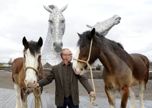 Kelpies creator Andy Scott with Baron, right, and Duke. Picture: Michael Gillen