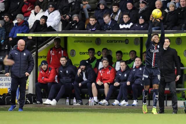 Myles Hippolyte's throw attracted St Mirren's anger. Pic by Michael Gillen.