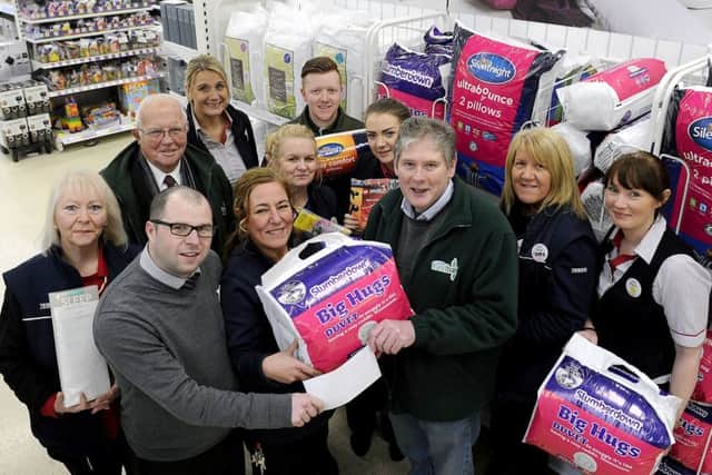 Tesco in Camelon donated money for a bed and bedding to Falkirk Foodbank this week. Picture: Michael Gillen