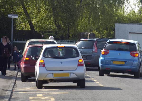 Eight parents were fined for inconsiderate driving at Larbert Village Primary School this morning. Picture: John Devlin