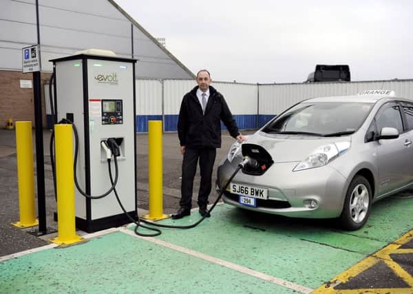 Taxi driver Derek Martin is the first to be awarded a licence for an electric car taxi. Picture: Michael Gillen