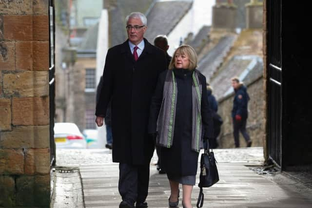 Memorial service at St Michael's Church Linlithgow for Tam Dalyell. guests arriving. Alistair Darling with his wife Margaret Vaughan