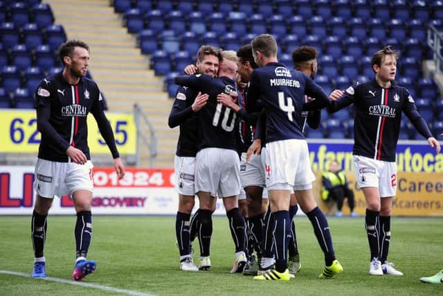Players congratulated Luke Leahy on another cracker from the left-back. Pic by Michael Gillen.