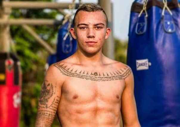 Joradn Coe, 20, from Falkirk
a Thai boxer who has died suddenly in Thailand