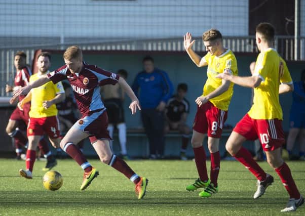 Alan Cook tries to find a way through the Albion Rovers defence (pic by Craig Halkett)