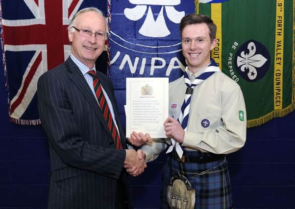 Alan Simpson. Lord Lieutenant of Stirling and Falkirk, presented Logan with his award