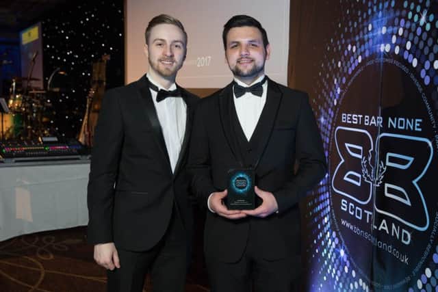 Platinum duo...from Sportsters in Falkirk were only too happy to collect one of five new Platinum awards presented at the ceremony to reward continuous excellence.