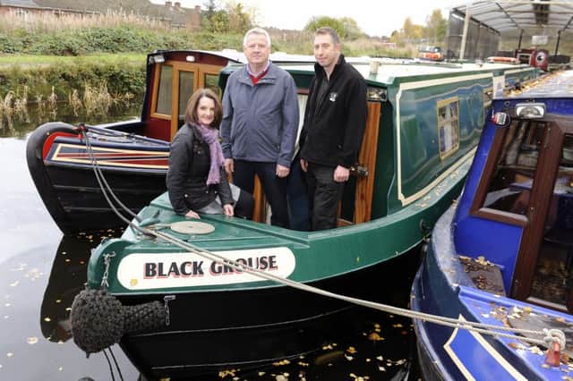 13-11-2013. Picture Michael Gillen. TAMFOURHILL. Falkirk Wheel. Capercaillie Cruises Ltd. Tim Ford and team, for business awards. Gail Jones front of house manager, Tim Ford MD and Ron Rusack operations manager.