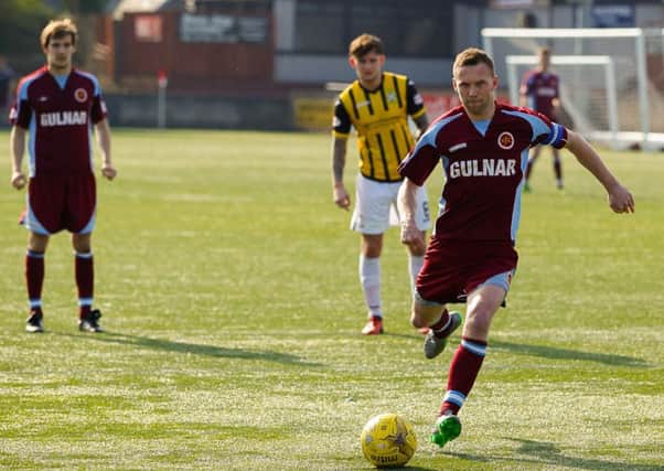Colin McMenamin takes the penalty which put Stenhousemuir 2-1 up.