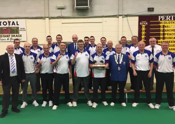 The Falkirk Indoor team celebrate their Scottish Cup success