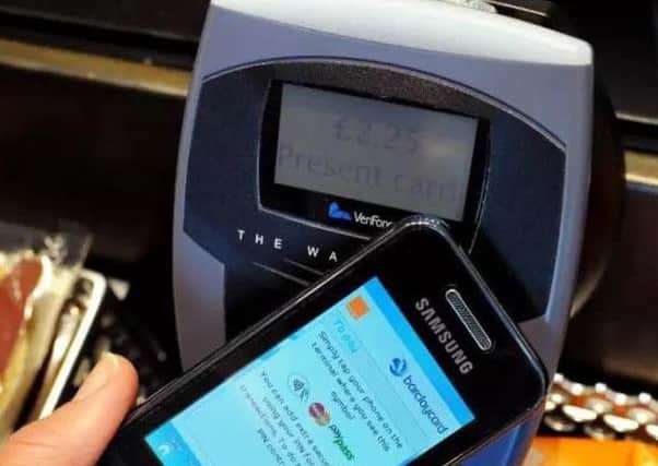 Making a contactless payment while driving could be costly