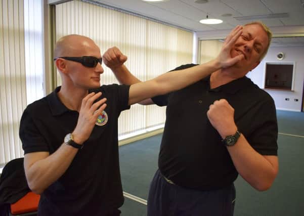Blind instructor David Black and Alan Bell of the Scottish Centre for Personal Safety