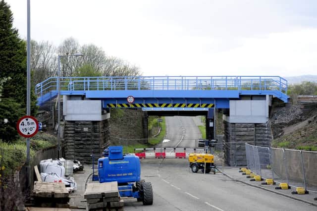 The new rail bridge is now in place over the A803 Glasgow Road at Carmuirs
Picture: Michael Gillen